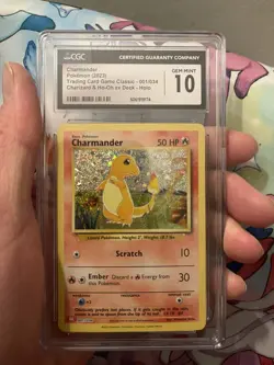 Pokemon TCG Charmander 001/034 Trading Card Game Classic Holo CGC 10 2023 - Image 1