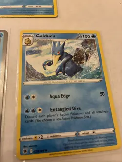 Lot Of 7 Psyduck and Golduck Pokemon Cards - Image 5
