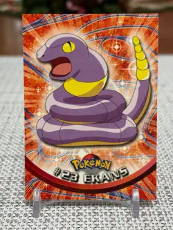 1999 Topps Pokemon #23 Ekans (TV Animation Series 1) 2nd Print Black Logo NM - Image 1