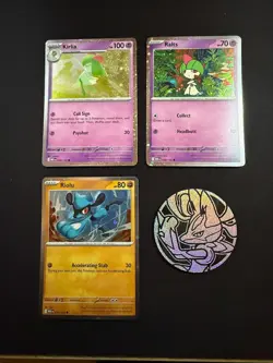 Pokemon Ralts, Kirlia, Riolu cards plus Lucario coin - Lunchbox Collector Chest - Image 1