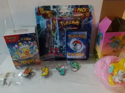 pokemon tcg lot sealed + Jirachi Toy + Pins - Image 1
