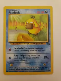 Near Mint 1999 Psyduck 53/62 Unlimited Fossil Set Pokemon Cards - Image 1