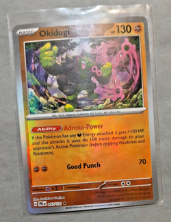 Pokemon TCG, Okidogi (Master Ball Pattern) 057/131 Sv: Prismatic Evolutions Holo - Image 3