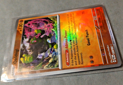 Pokemon TCG, Okidogi (Master Ball Pattern) 057/131 Sv: Prismatic Evolutions Holo - Image 4