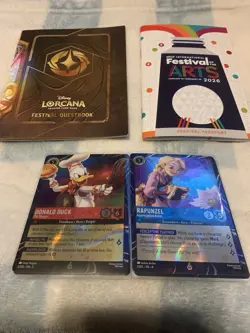 Disney Lorcana 2026 Festival of the Arts - Donald + Rapunzel Promo Cards + books - Image 1