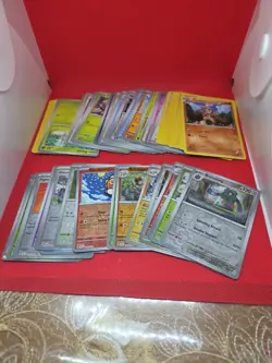 LOT 56: Pokemon Tcg Bundle Lot Vary Conditions Holo Reverse Holos Bulk 60+ Cards - Image 1