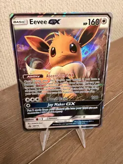Pokemon TCG Eevee GX SM176 Sun & Moon Black Star Promo Holo NM Condition - Image 1