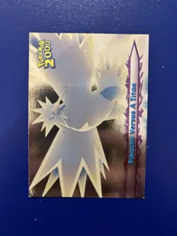 2000 TOPPS POKEMON THE MOVIE 2000 34 PIKACHU VERSUS A TITAN FOIL - Image 1