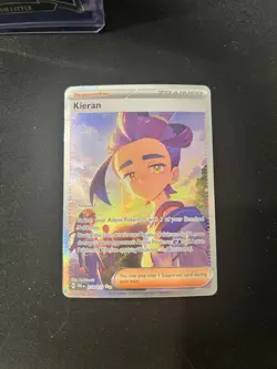 Pokemon TCG Kieran Trainer Prismatic Evolutions Card 174/131 - Image 1