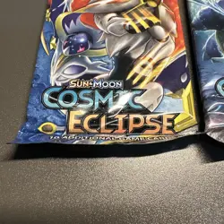 Pokemon Sun & Moon TCG Cosmic Eclipse Sealed Booster Pack (LOT OF 2) D21 TIN - Image 2