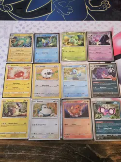 (12) Pokemon TCG Cosmo Holo Mixed Card Lot. NM. Sleeved/No Duplicates - Image 1