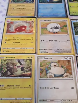 (12) Pokemon TCG Cosmo Holo Mixed Card Lot. NM. Sleeved/No Duplicates - Image 2