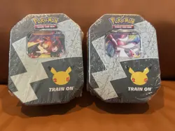 Pokemon 25th Anniversary Celebrations Tin Set: Lance's Charizard & Dark Sylveon - Image 1