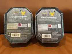 Pokemon 25th Anniversary Celebrations Tin Set: Lance's Charizard & Dark Sylveon - Image 2