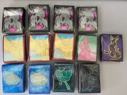 Pokemon Lot Of 13 Various Sealed ETB Sleeves - 65 Count - Image 1