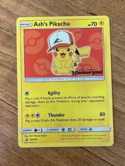 ⚡Ash’s Pikachu - SM109 Pokemon TCG - Special Black Star Promo Card - Red - Image 1