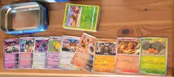 Lot Of 53 Pokemon Cards With Tin Holder And Holos - Image 1