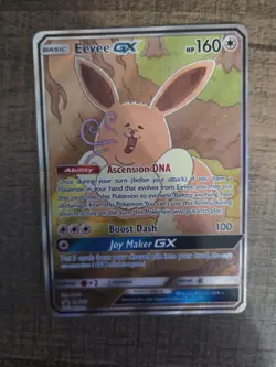 Pokemon TCG Eevee Gx Full Art Black Star Promo Sun & Moon - Image 1