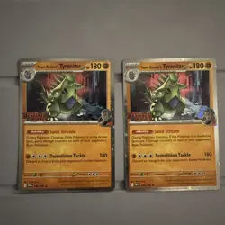 Team Rocket's Tyranitar 096/182 Destined Rivals Stamped Pre Release Pokemon Card - Image 1