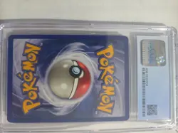 Pokemon TCG Fossil Unlimited Dragonite Holo Rare 4/62 CGC 8.5 1999 - Image 2