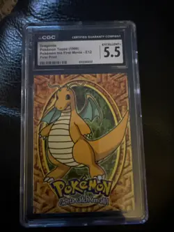 CGC 5.5 Excellent + Dragonite #E12 Topps Pokemon the First Movie First Print - Image 1