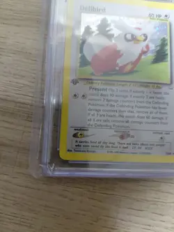 POKEMON 2001 NEO REVELATION DELIBIRD HOLO 5/64 CGC 7 NM - Image 5