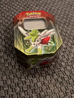 2009 Shaymin Tin Full of Bulk Pokemon Cards - Image 2