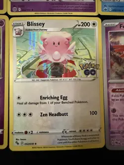 Lot of 10 Holographic English Pokemon Pokemon Cards Holo Rare Blissey Togakiss - Image 2