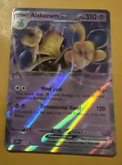 Pokemon TCG 151 Error No Star Pattern – Alakazam ex 050 Black Star Promo - Image 1