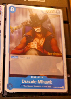 ONE PIECE ENGLISH CARD GAME CARTE PRE RELEASE Dracule Mihawk OP07-044 EN MINT - Image 1