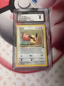 CGC 8 Eevee 2000 Black Star Promos 11 Pokemon League Pokemon Card - Image 1