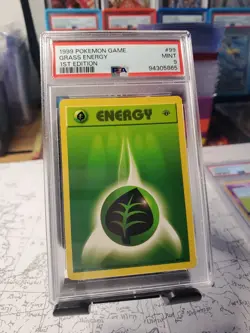 1999 Pokemon - 1st Edition Grass Energy - Base Set 99/102 - PSA 9 Mint! - WOTC - Image 1