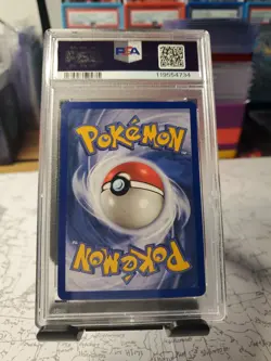 1999 Pokemon Fossil Slowpoke 1st Edition PSA Grade 9 - Image 2