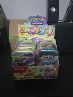 Pokemon Prismatic Evolutions Mini Tin Display Box - Full Set - 8 tins - Image 1
