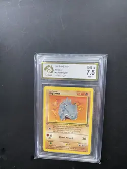 Pokemon TCG Rhyhorn Jungle 61/64 Regular 1st Edition Common CGA 7.5 - Image 1
