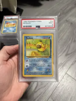 Pokemon 1999 Fossil Psyduck #53 PSA 9 - Image 1