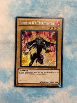 YUGIOH ELEMENTAL HERO BURSTINATRIX SECRET RARE NM LCGX-EN004 - Image 1