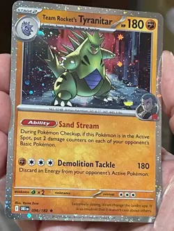 POKEMON TEAM ROCKET'S TYRANITAR 096/182 RARE COSMOS HOLO WITH SWIRL NM CARD - Image 1