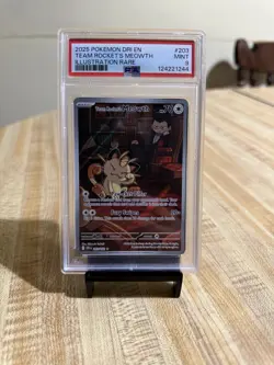 2025 Pokemon DRI EN Team Rocket’s Meowth Illustration Rare #203 (PSA 9 MINT) - Image 1