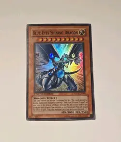 Yugioh Blue-Eyes Shining Dragon MOV-EN001 Super Rare NM - Image 1
