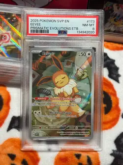 2025 POKEMON SVP EN-SV PRISMATIC EVOLUTIONS ETB PROMO #173 EEVEE PSA 8 - Image 2