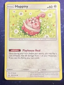 Pokemon TCG 2019 - Happiny 161/214 - Unbroken Bonds - LP - Regular - Image 1