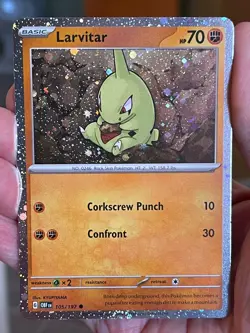 POKEMON LARVITAR 105/197 COMMON COSMOS HOLOFOIL HALF SWIRL BOTTOM NM CARD - Image 1