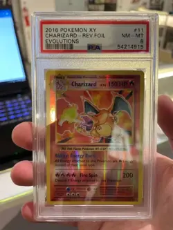 Pokemon Charizard 11/108 Evolutions Reverse Holo PSA 8 - Image 1