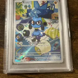 2023 POKEMON SVI EN-SCARLET & VIOLET ILLUSTRATION RARE #215 RIOLU PSA 9 - Image 3
