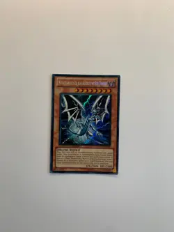 Yugioh Karte: Niedertrachtiger Blauaugiger Weißer Drache (YMP1-DE002) - Secret R - Image 1