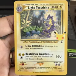 Pokemon TCG Celebrations Light Toxtricity SWSH137 Black Star Promo TREE SWIRL - Image 1