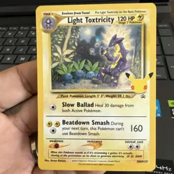 Pokemon TCG Celebrations Light Toxtricity SWSH137 Black Star Promo ROCK SWIRL - Image 1