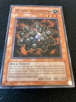 The Earth - Hex-Sealed Fusion - FET-EN029 - Common - Unl Edition - LP - YuGiOh! - Image 1