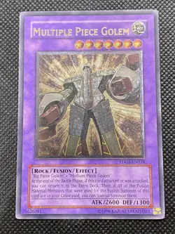 YuGiOh Multiple Piece Golem TDGS-EN038 Ultimate Rare Unlimited Edition Near Mint - Image 1